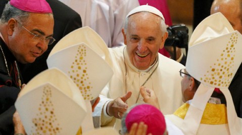 Pope greets bishops as he arrives to celebrate Mass at Rio's Cathedral of St. Sebastian